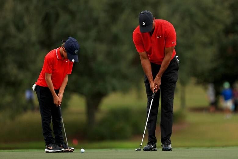 Featured Post Image - Golf: Tiger dan putranya Charlie menyelesaikan lima pukulan di Orlando