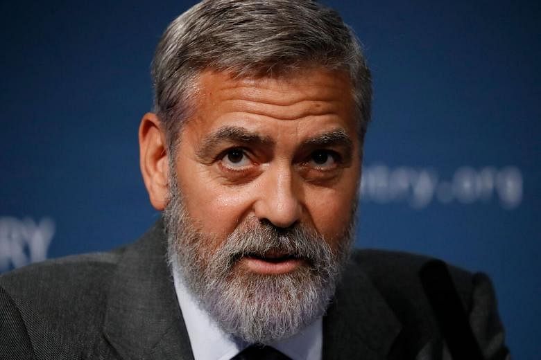 Featured Post Image - Rahasia rambut George Clooney? Lampiran penyedot debu Flowbee