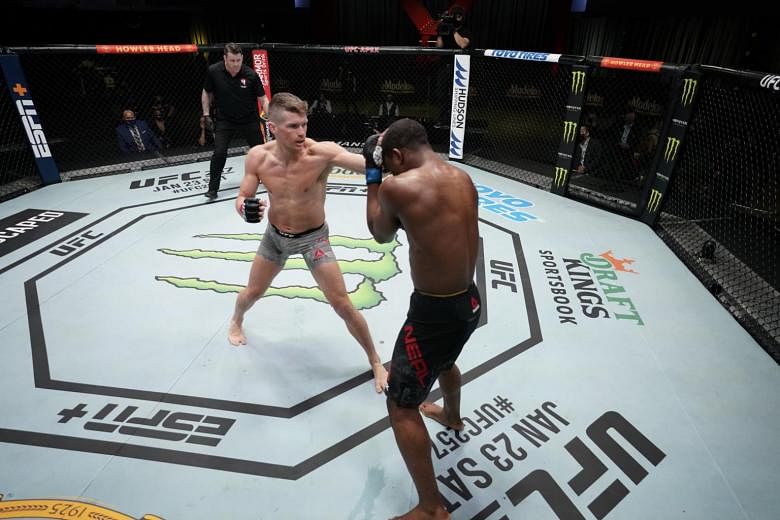 Featured Post Image - MMA: ‘Wonderboy’ Thompson mengalahkan Neal dengan keputusan bulat